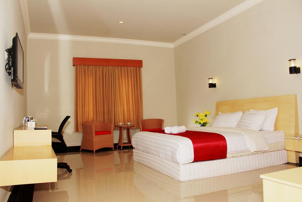 Raja Residence Jambi Джамби Стая снимка